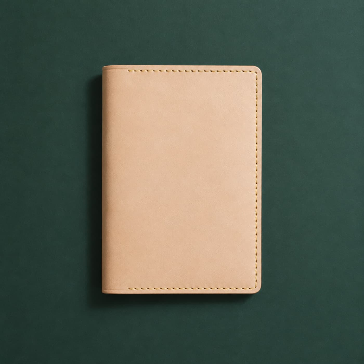The same passport cover at day one